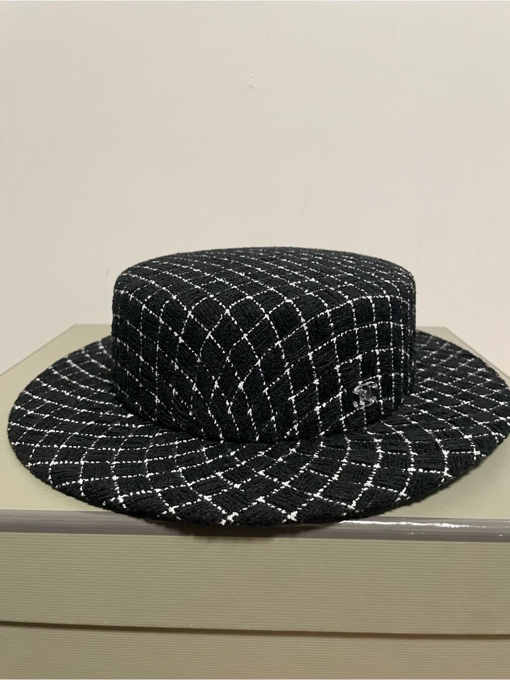 CHANEL Black Tweed Bowler with White Grid Stitching and Clear CC Pin